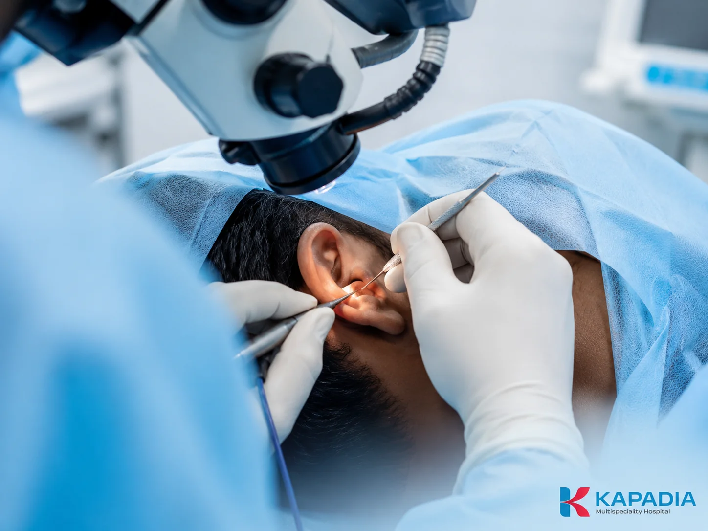 ENT surgeon performing an eardrum repair (tympanoplasty) at Kapadia Multispeciality Hospital, Mumbai