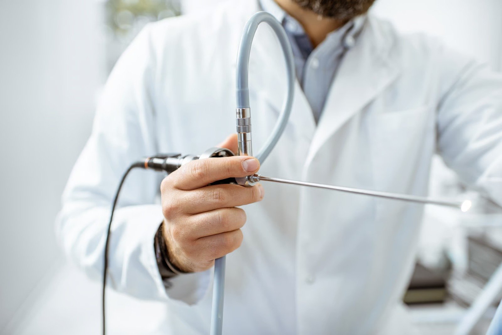 Doctor preparing a sterile endoscope before an endoscopy appointment at Kapadia Hospital, Mumbai