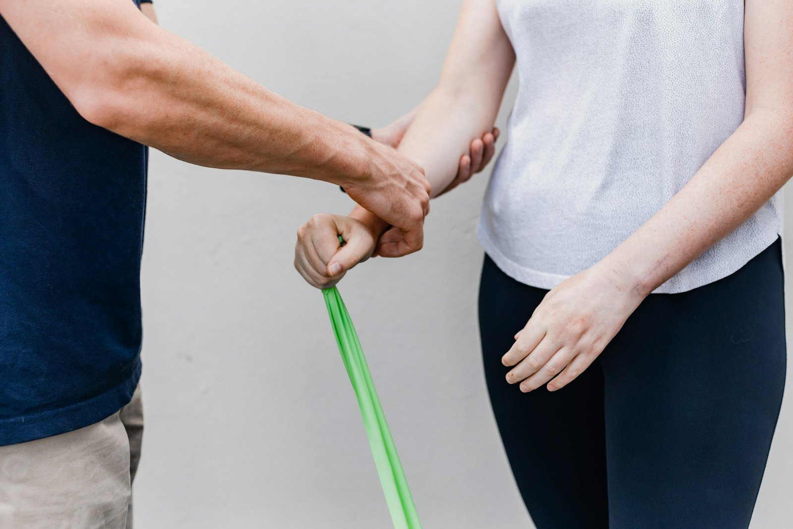 Resistance-band shoulder rehabilitation exercise for frozen shoulder recovery at Kapadia Hospital, Mumbai