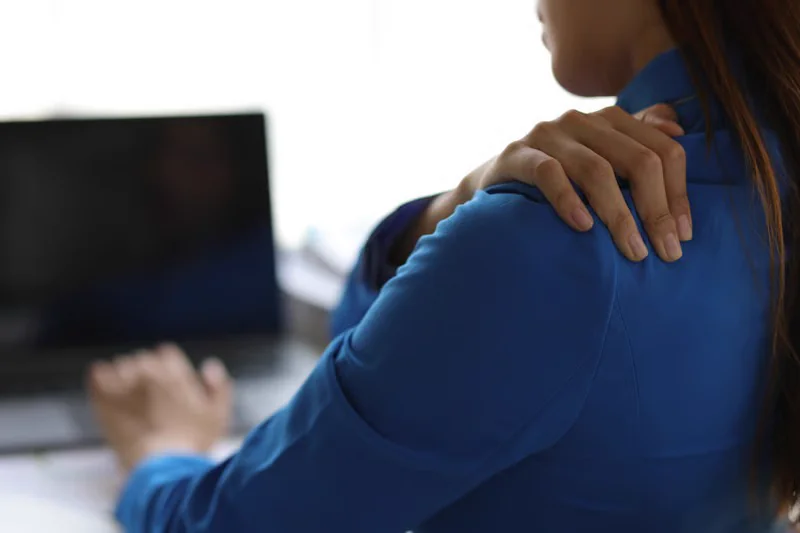 Therapist guiding assisted shoulder-mobility movement for frozen shoulder at Kapadia Hospital, Mumbai