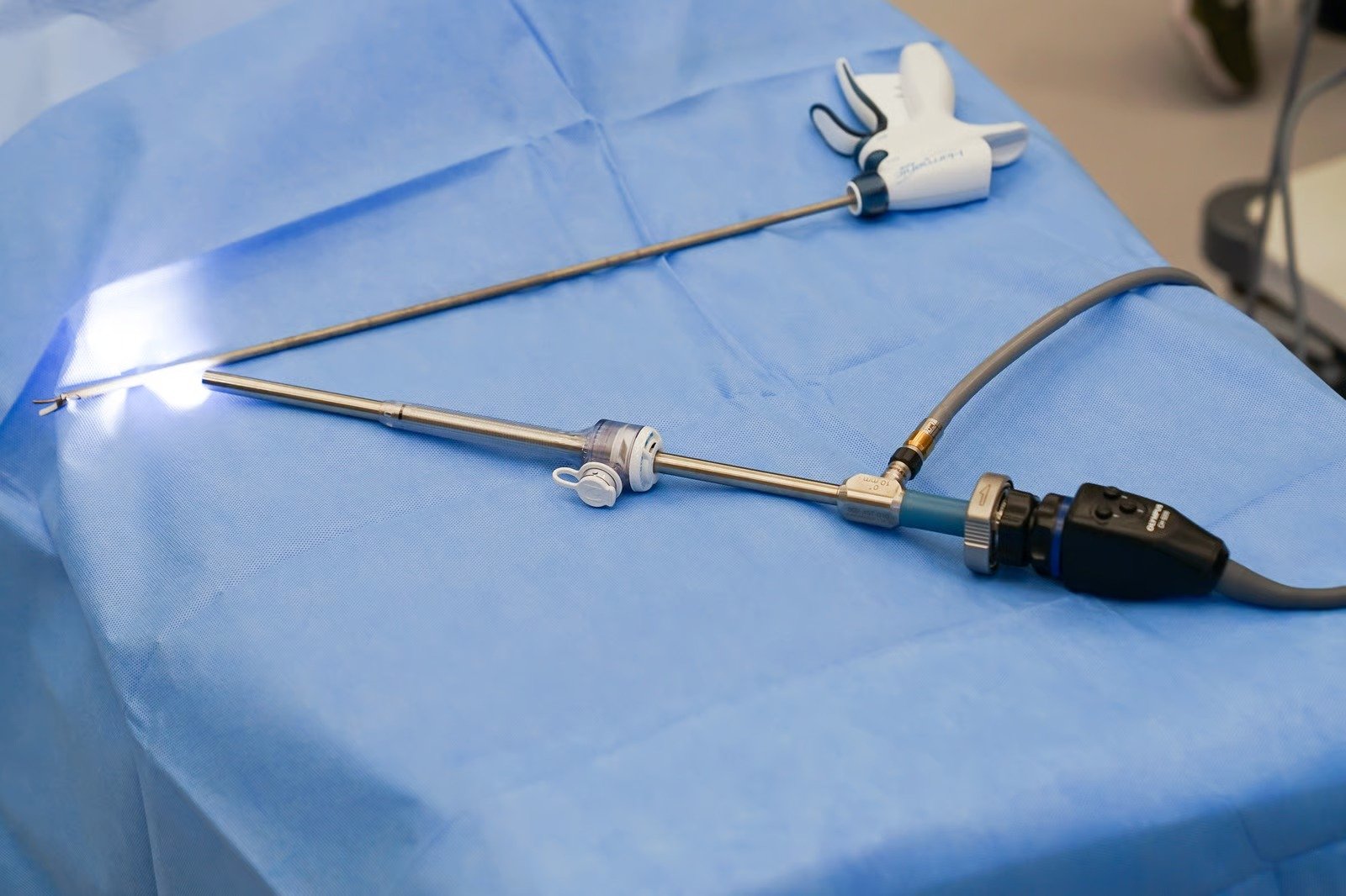 Laparoscope, camera head and keyhole surgical instruments laid out on a sterile drape before laparoscopic surgery at Kapadia Hospital, Mumbai